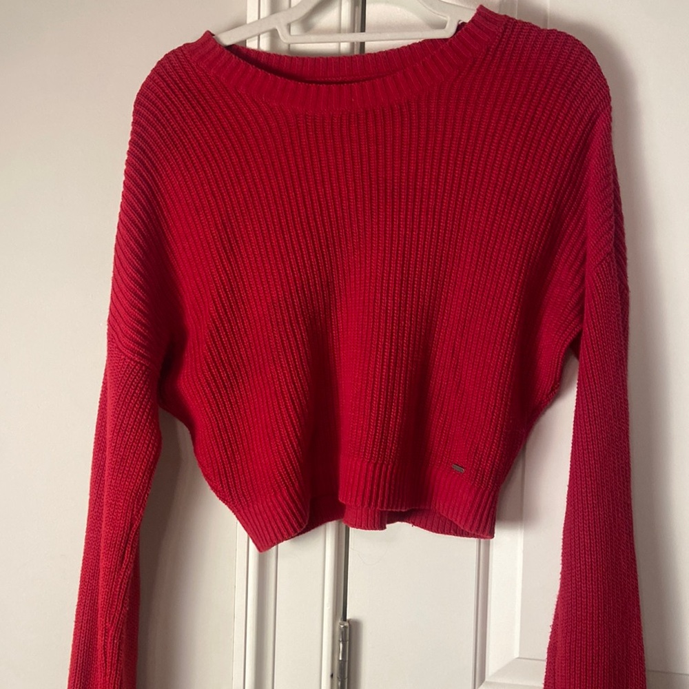 Small Holister red sweater never worn before